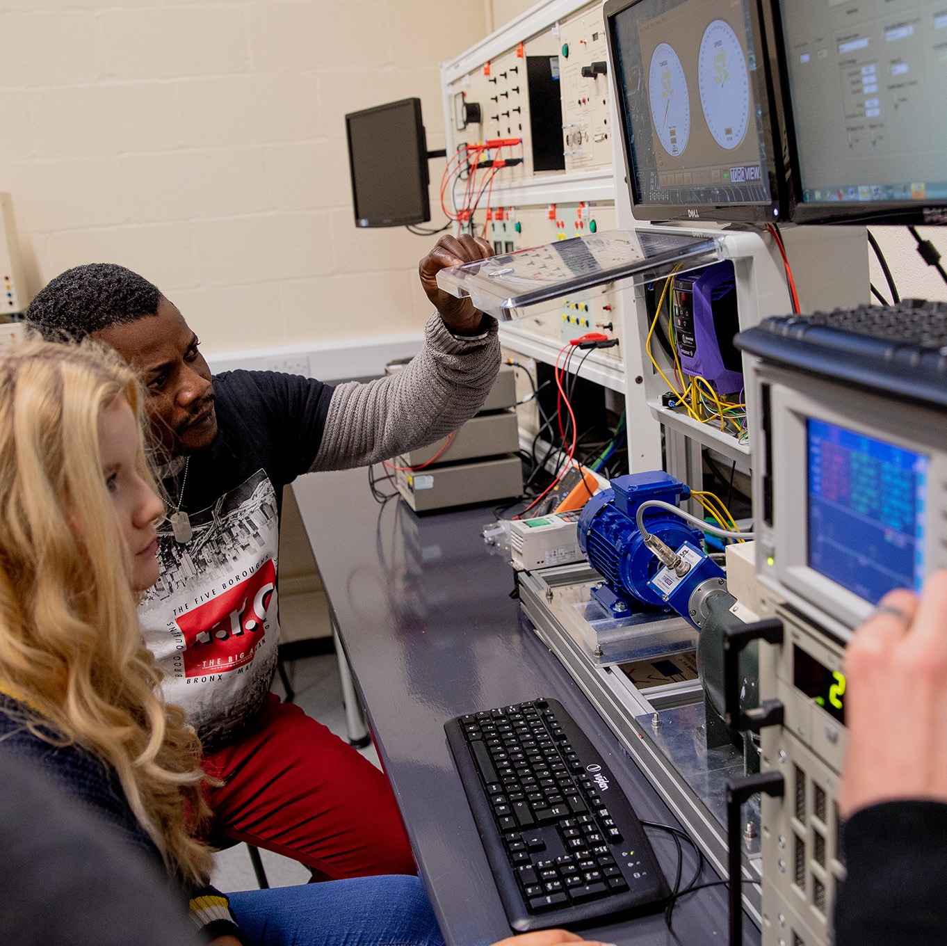 Students using electrical engineering facilities